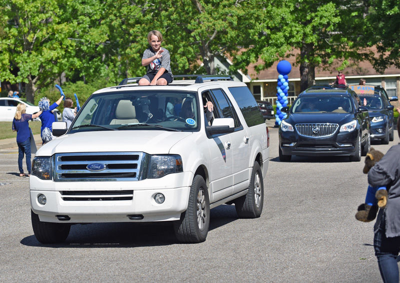 Teachers hold parade for students at Houston Academy